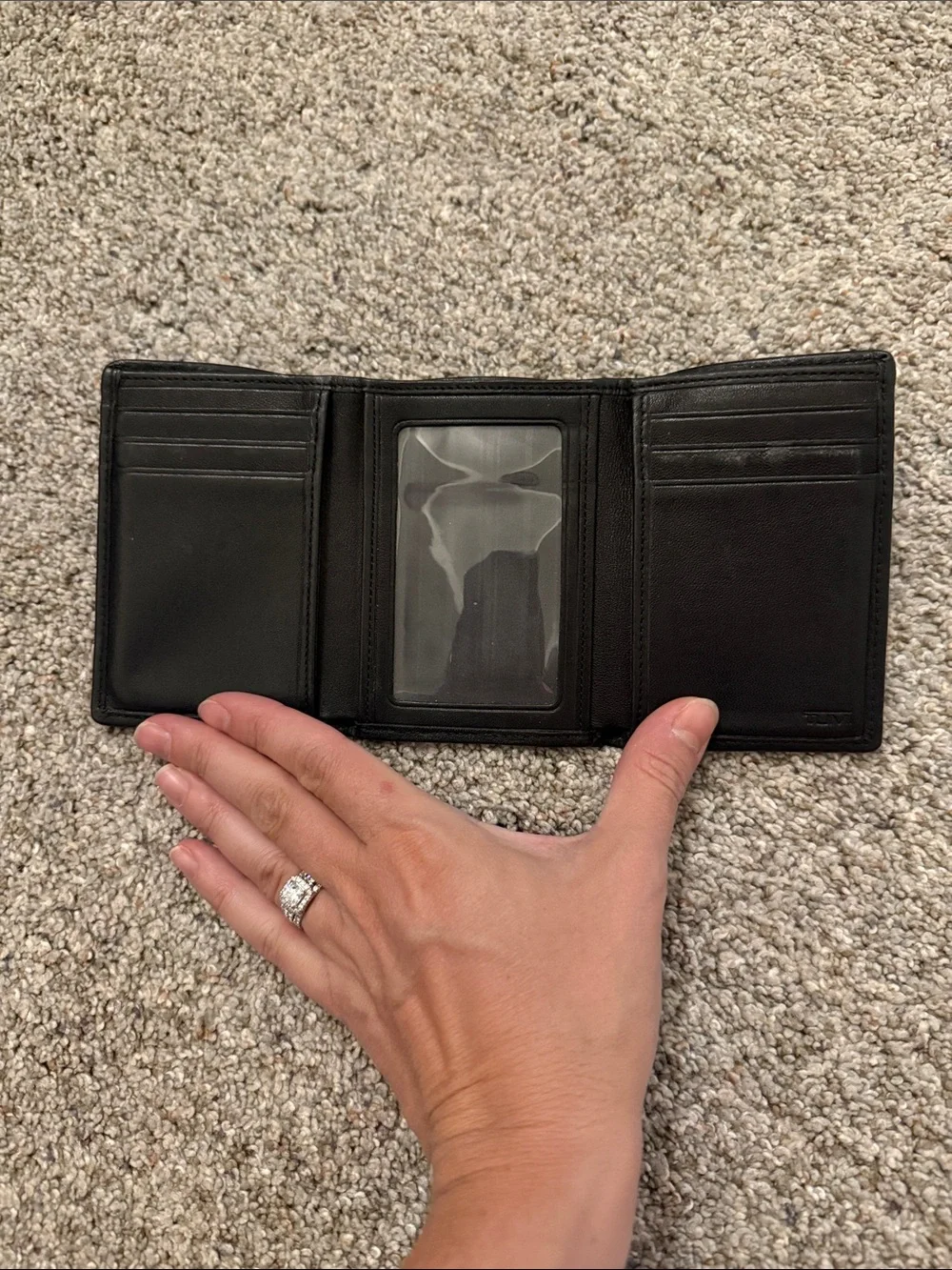 Tumi Black Leather Trifold Wallet with Red Fabric Trim